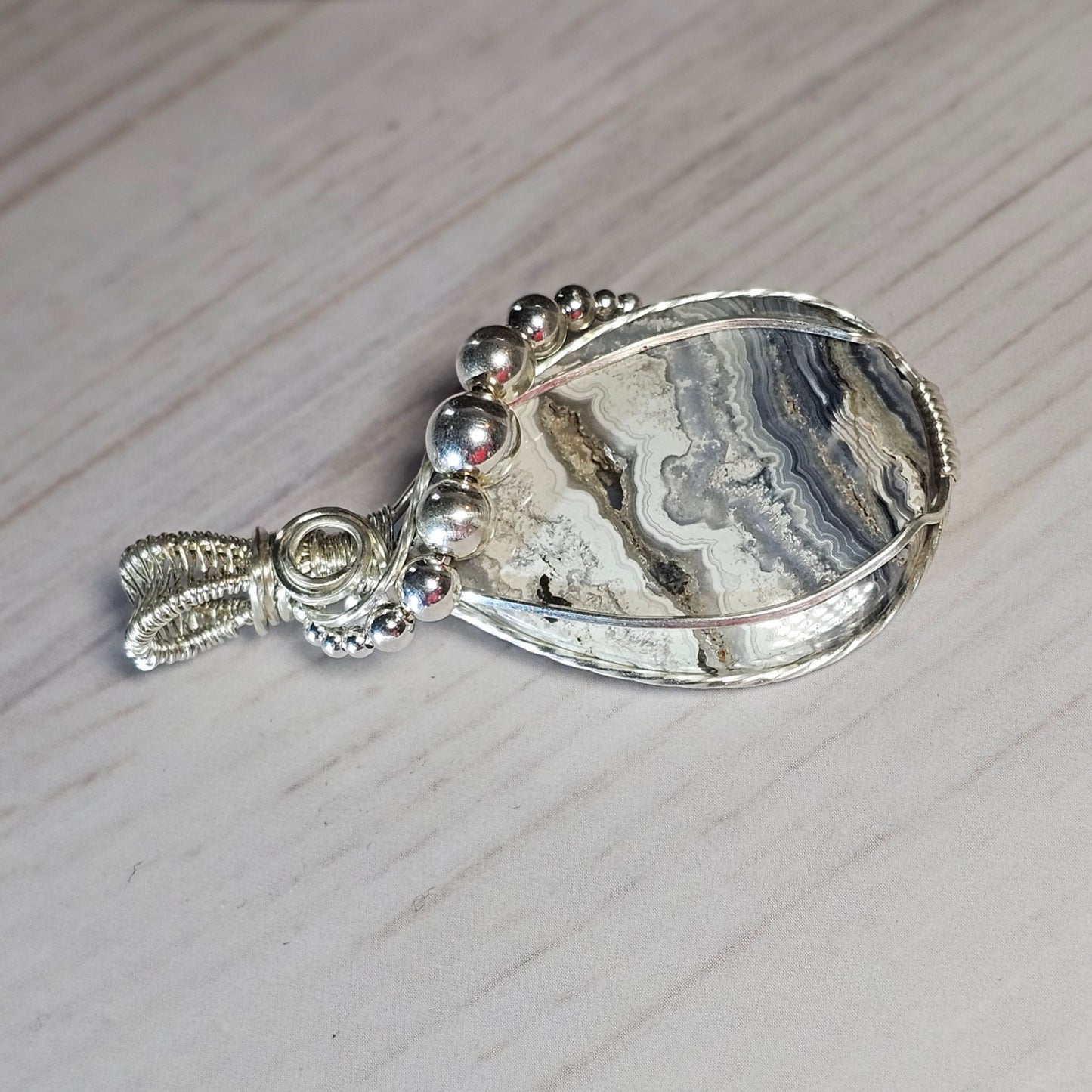 Black Lace Agate Sterling Silver Wire-Wrapped Pendant